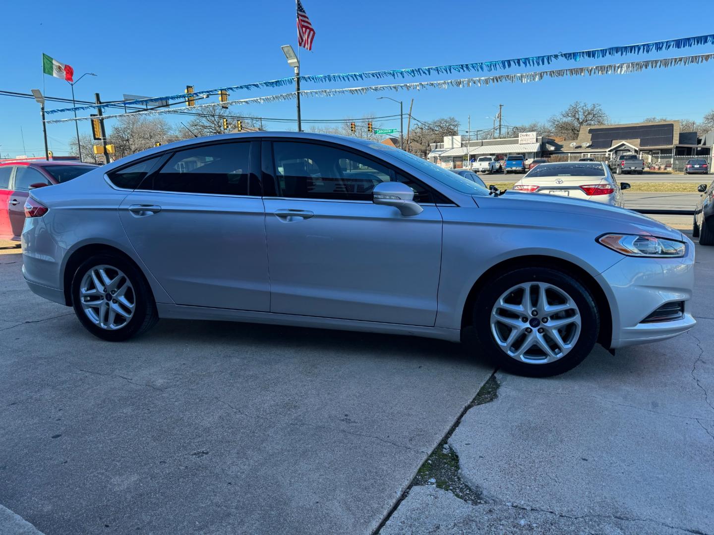 2016 SILVER FORD FUSION SE (3FA6P0H77GR) , located at 5900 E. Lancaster Ave., Fort Worth, TX, 76112, (817) 457-5456, 0.000000, 0.000000 - Photo#2